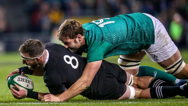 Kieran Read (L) in action against Ireland at the Aviva Stadium in November