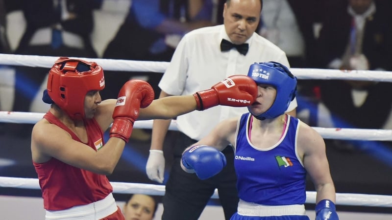Simranjit Kaur lands a punch against Ireland's Amy Broadhurst