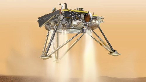 NASA handout shows an illustration of a simulated view of NASA's InSight probe about to land on Mars