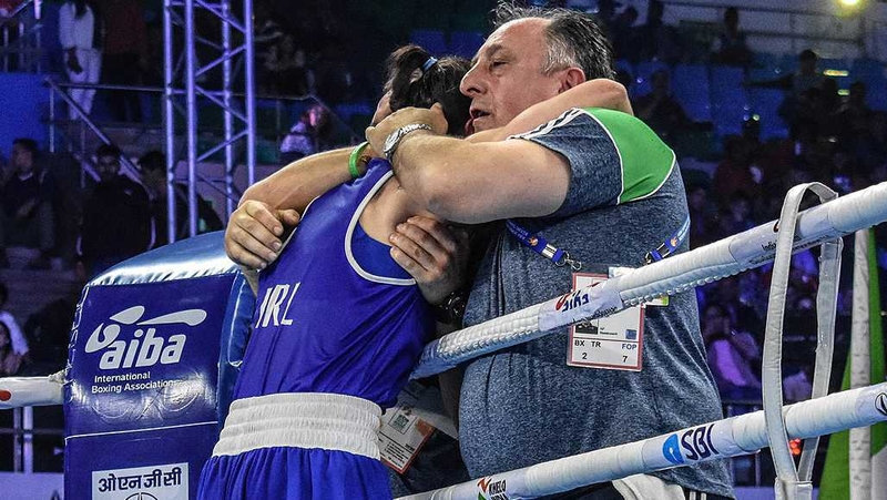 Kellie Harrington embraces Zaur Antia after winning her gold