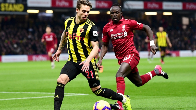 Sadio Mane of Liverpool chases Kiko Femenia of Watford