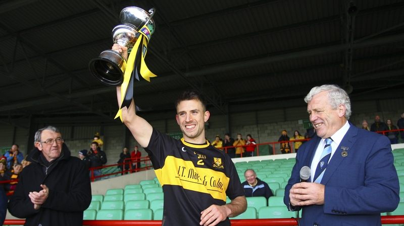Dr Crokes captain John Payne lifts the O'Connor Cup as Crokes collect another Munster crown