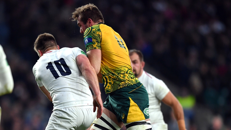 Izack Rodda of Australia is tackled by Owen Farrell