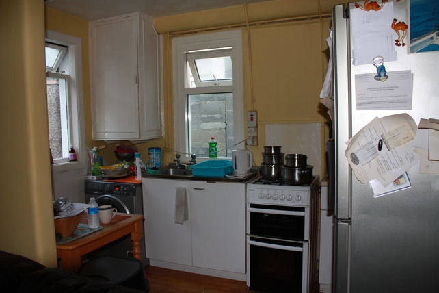 Before: The small kitchen was cluttered