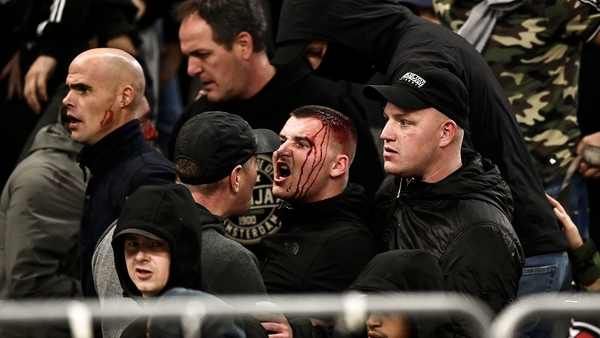 Bloodied spectators inside the stadium