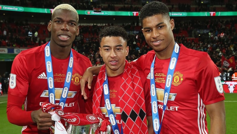 Paul Pogba, Jesse Lingard and Marcus Rashford celebrate the 2018 League Cup success
