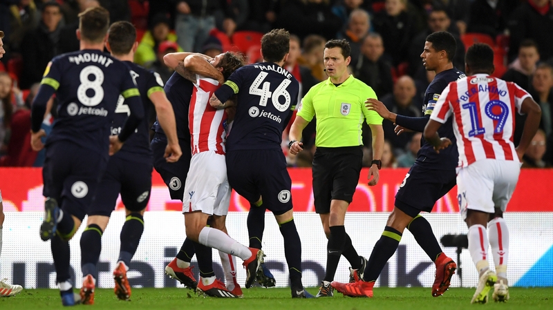Bradley Johnson of Derby County clashes with Joe Allen of Stoke City