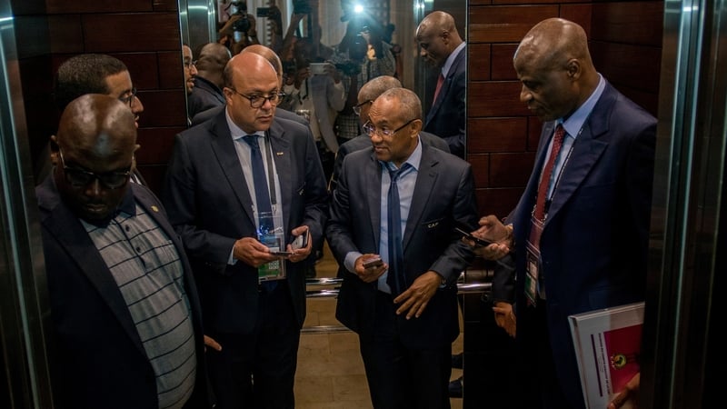 President of South African FA Danny Jordaan (c) pictured in an elevator after an extraordinary meeting with CAF executives