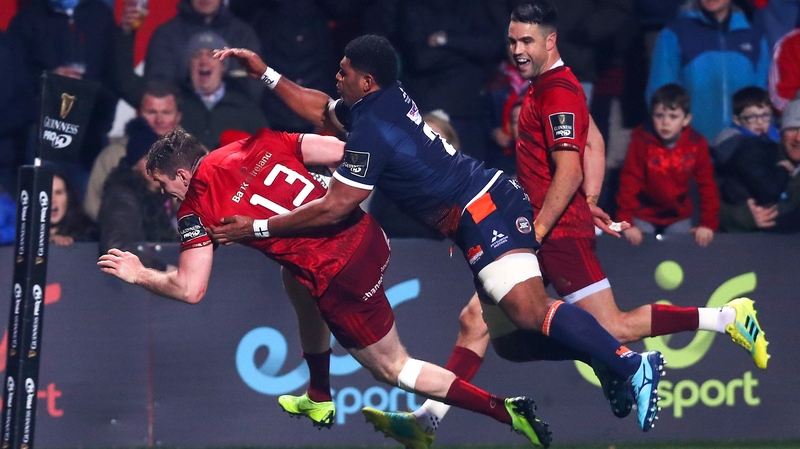 Chris Farrell crosses for a try with Conor Murray watching on