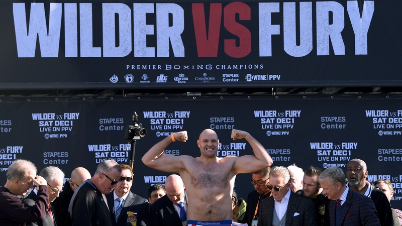 Tyson Fury poses during the weigh-in at Los Angeles Convention Center