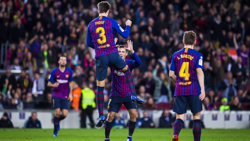 Gerard Pique celebrates scoring the opening goal