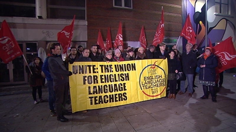 Teachers held a protest outside the private college this evening