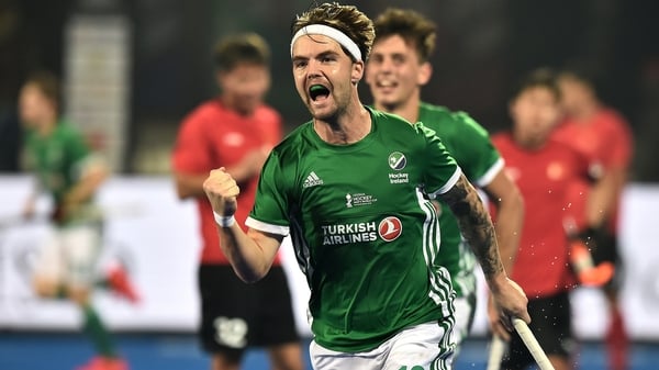 Alan Sothern celebrates his fine finish against China in Ireland's last Pool B match.