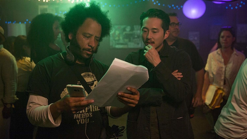 Boots Riley with Steven Yeun while filming Sorry to Bother You