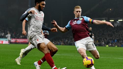 Joe Gomez of Liverpool with Ben Bee of Burnley