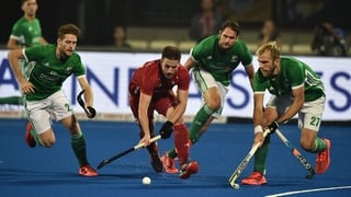 England's Liam Ansell goes on the charge against Ireland in Bhubaneswar
