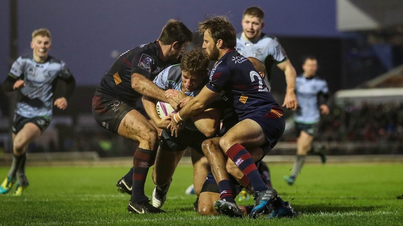 Connacht's Kyle Godwin barges over for a try