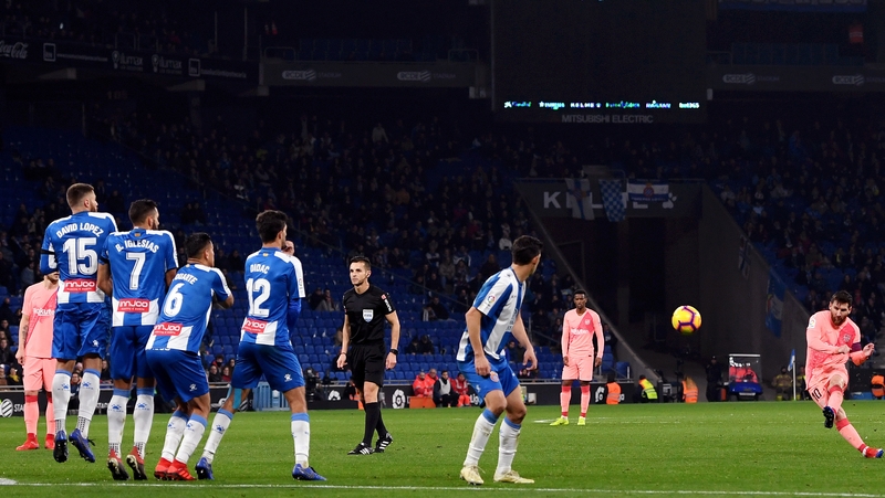 Lionel Messi curls home a free-kick against Espanyol