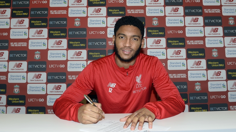 Joe Gomez puts pen to paper