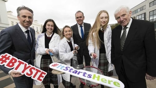 MD of BT Ireland, Shay Walsh, Minister for Education and Skills, Joe McHugh TD, and co-founder of the BTYSTE, Dr. Tony Scott with Lucan Community College students; Faye Murphy, Córa O'Toole, and Tara Phelan.
