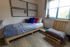 After: An understated colour scheme opens up the room