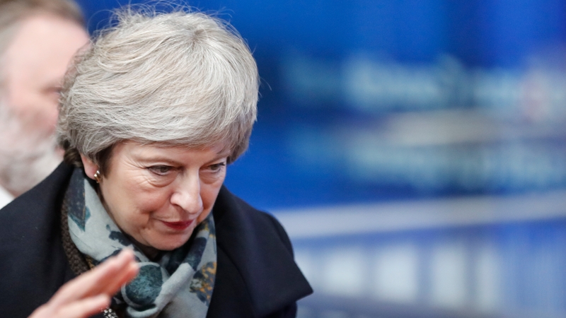 Theresa May is meeting European leaders while her opponents seek to oust her at home