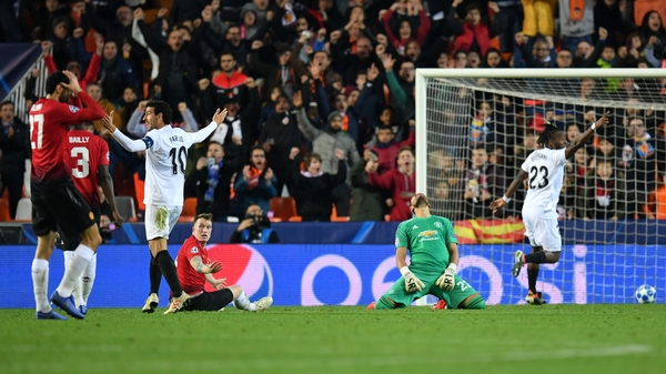 Phil Jones puts the ball past his own goalkeeper Sergio Romero at the Mestalla