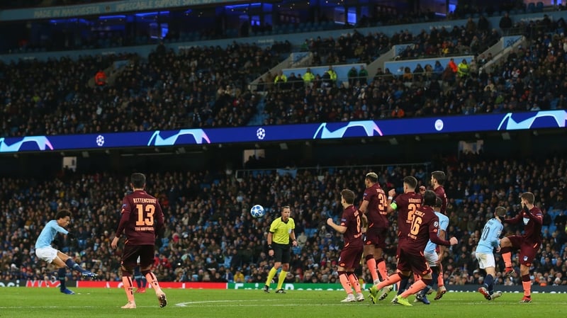 Leroy Sane scores from a free kick