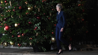 Theresa May strides out of Downing Street to address the media