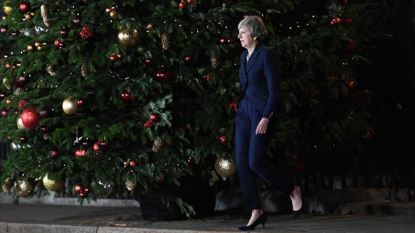 Theresa May strides out of Downing Street to address the media