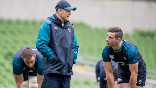Ireland head coach Joe Schmidt talks to John Cooney during the international window last month
