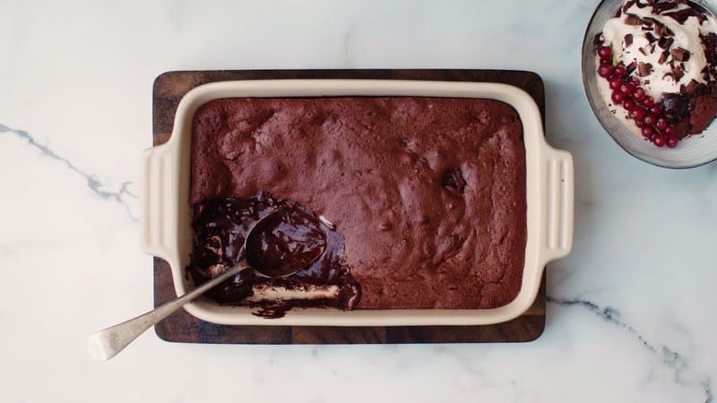 Chocolate and Cherry Lava Cake with Cardamom whipped cream and shaved chocolate