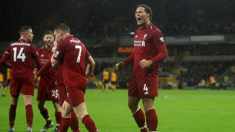 Virgil Van Dijk celebrates his goal against Wolves