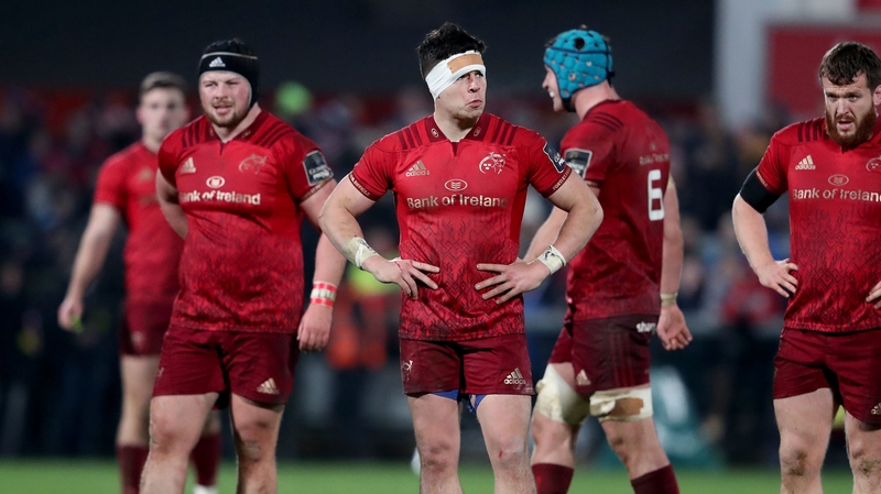 Munster players dejected after losing to Ulster.