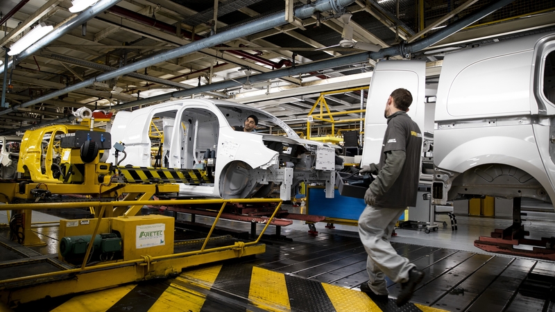 A Renault employee works on vehicle production assembly line at the Renault factory in Maubeuge, north-eastern France