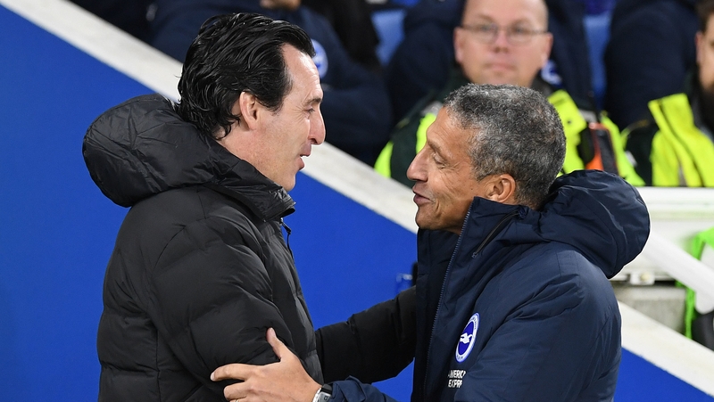 Emery was all smiles with with Brighton manager Chris Hughton before the game
