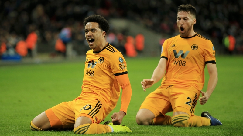 Helder Costa of Wolverhampton Wanderers celebrates with Matt Doherty