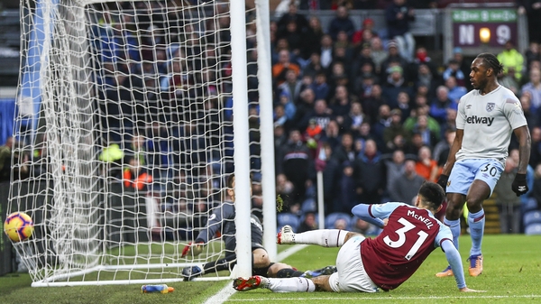 Dwight McNeil scores at the near post for Burnley