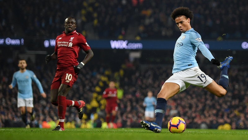Sane (R) scores City's second goal against Liverpool