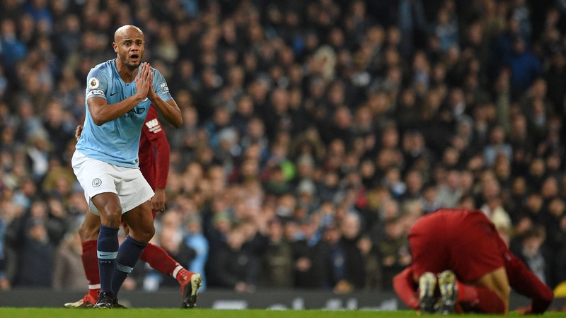 Vincent Kompany pleads his innocence after tackling Mo Salah