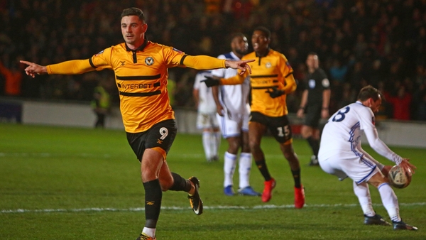 Padraig Amond (L) celebrates after scoring Newport's second