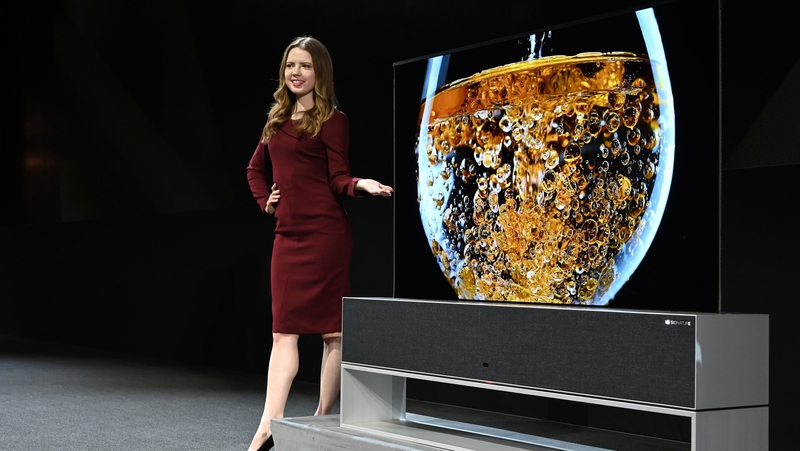 South Korean giant LG unveiled its ultra-high definition television that rolls into and out of a base stand at CES in Las Vegas