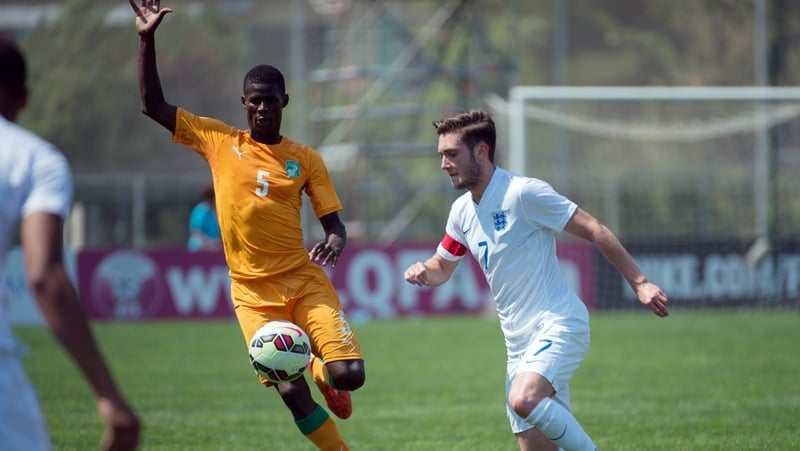 Vakoun Issouf Bayo (l) in action for the Ivory Coast