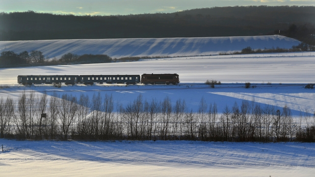 A passenger train is pictured in the snow-covered Bakony region near Epleny, some 120km southwest of Budapest, Hungary