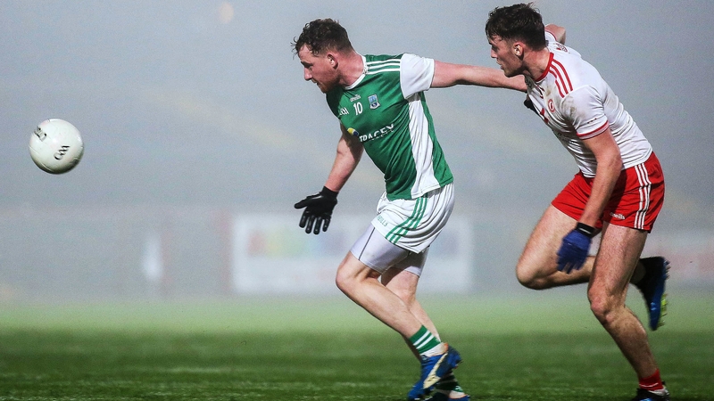 Fermanagh's Aidan Breen and Tyrone's Brian Kennedy