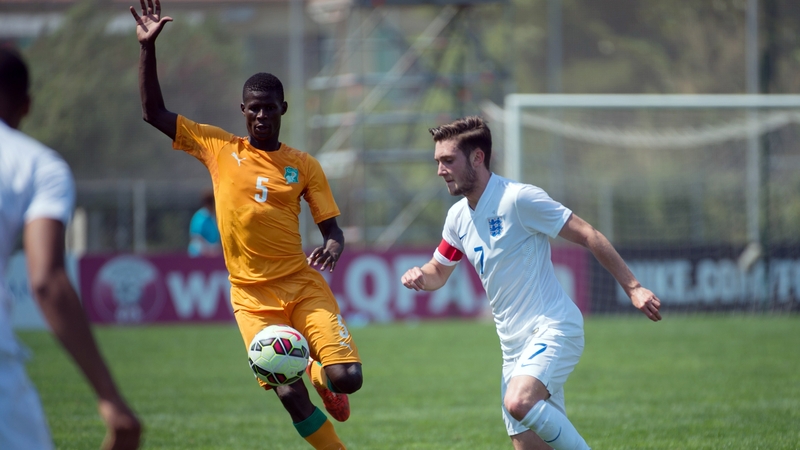 New Celtic signing Vakoun Issouf Bayo, left, in action for Ivory Coast U21s against England in 2015