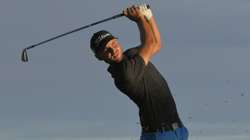 Svensson watches from the 17th tee