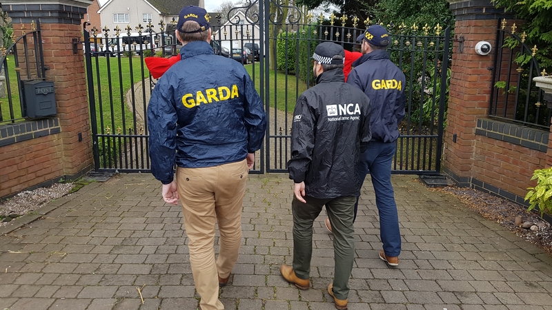 Gardaí were part of a search team that raided the gang leader's house today (Pic: National Crime Agency)
