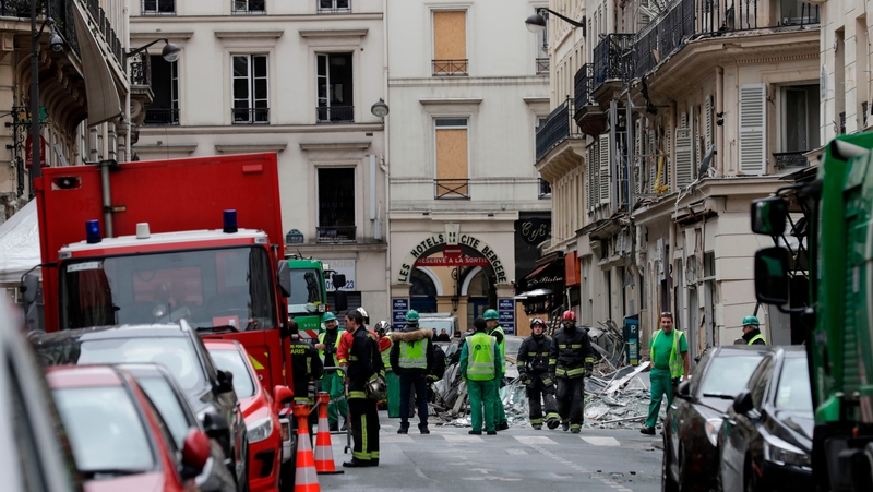 Emergency personnel continue their work at the scene