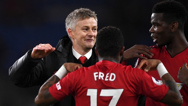 All smiles: Solskjaer and Pogba